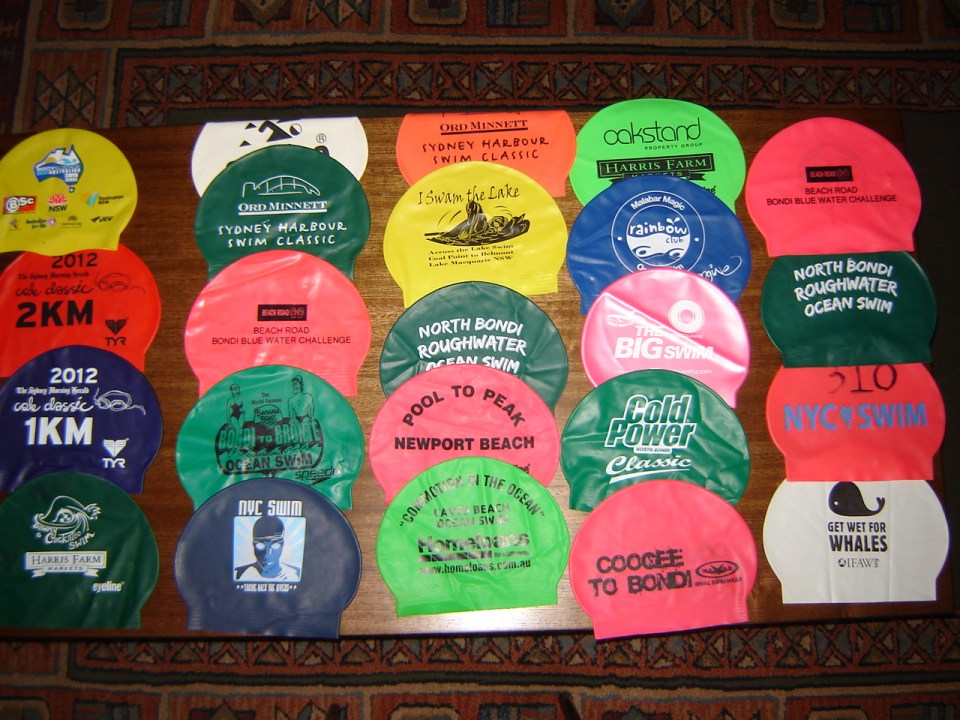 Some of my collection of swim caps