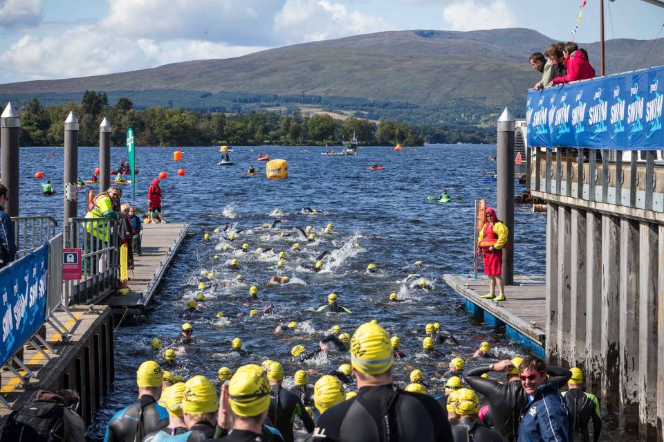 The crush as the swimmers try to enter the water after the start